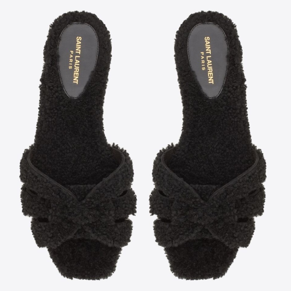 Saint Laurent Tribute genuine shearling flat sandals.